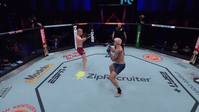 Two Men Fighting In Boxing Ring Sponsored By ZipRecruiter And Modelo GIF