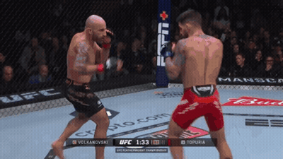 Two Men Fighting In Boxing Ring UFC 1:33 Background GIF