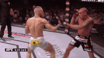 Two Men Fighting In Boxing Ring UFC 3:19 GIF