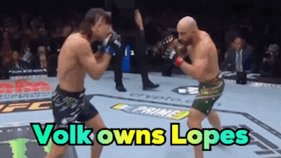 Two Men Fighting In Boxing Ring Volks Owns Lopes GIF