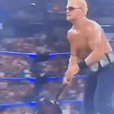 Two Men Fighting In Boxing Ring With Crowd GIF