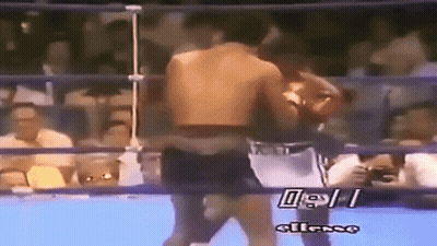 Two Men Fighting In Boxing Ring With Ellesse GIF