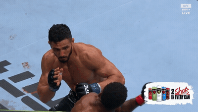Two Men Fighting In Boxing Ring With Energy Drink GIF