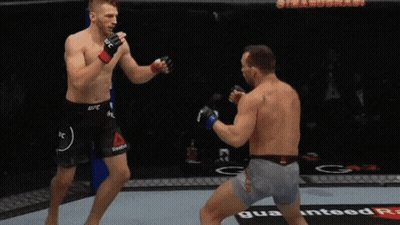 Two Men Fighting In Boxing Ring With ESPN Sign GIF