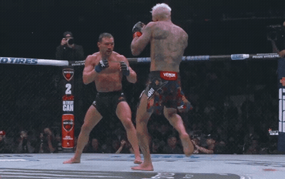 Two Men Fighting In Boxing Ring With Gatorade GIF