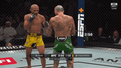 Two Men Fighting In Boxing Ring With Manscaped Banner GIF