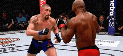 Two Men Fighting In Boxing Ring With Metropcs GIF