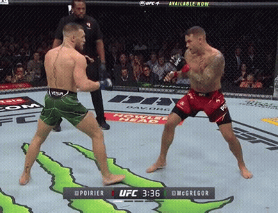 Two Men Fighting In Boxing Ring With Monster Energy Ad GIF