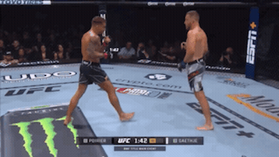 Two Men Fighting In Boxing Ring With Monster Energy Drink GIF