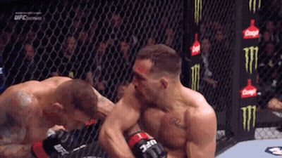 Two Men Fighting In Boxing Ring With Monster Energy Sign GIF