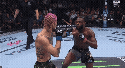 Two Men Fighting In Boxing Ring With Number 30 Shirt GIF