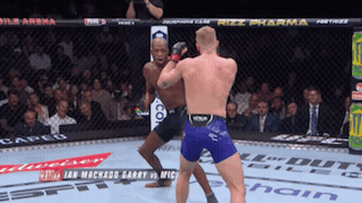 Two Men Fighting In Boxing Ring With Rizz Pharma GIF