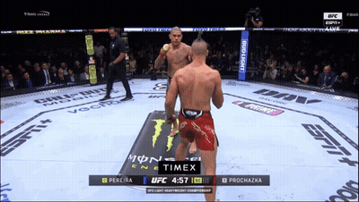 Two Men Fighting In Boxing Ring With Timex Logo GIF