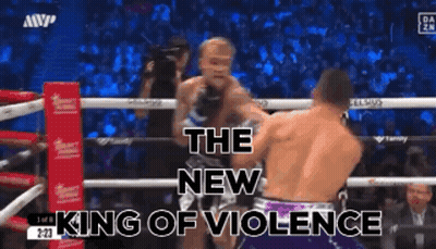 Two Men Fighting In Boxing Ring GIF