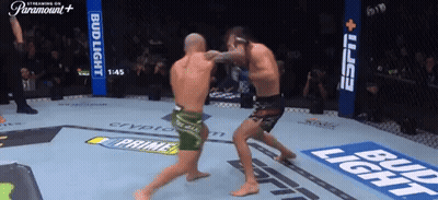 Two Men Fighting In Bud Light And ESPN Boxing Ring GIF