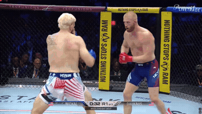 Two Men Fighting In Cage Nothing Stops Ram GIF