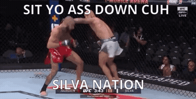 Two Men Fighting In Cage Saying Sit Yo Ass Down Cuh Silva Nation GIF