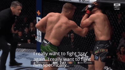 Two Men Fighting In Cage Want To Fight Izzy Again GIF