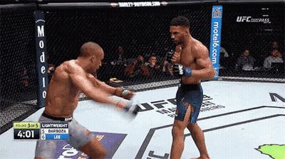 Two Men Fighting In Cage With Motel6.com GIF