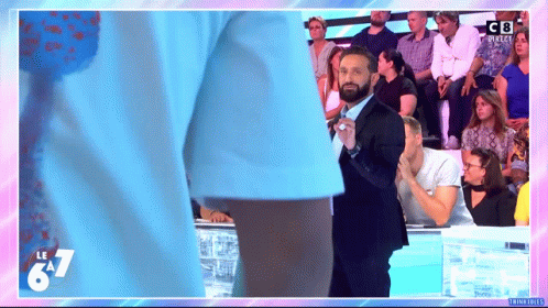 Two Men Fighting In Cage With Toyota Banner GIF