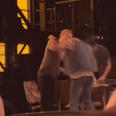 Two Men Fighting In Dark Room GIF