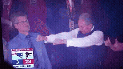 Two Men Fighting In Front Of Fox Sports Screen GIF