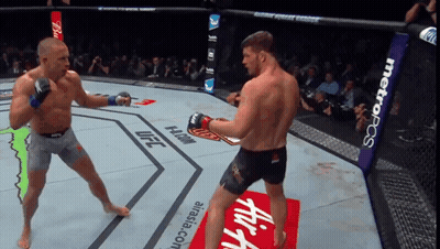 Two Men Fighting In Ring GIF