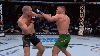 Two Men Fighting In Ring Strickland Won GIF