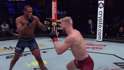 Two Men Fighting In Ring With Bodyarmor Ad GIF