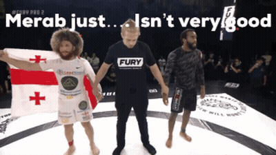 Two Men Fighting In UFC Match At 4:41 GIF