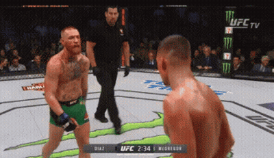 Two Men Fighting In UFC Ring GIF