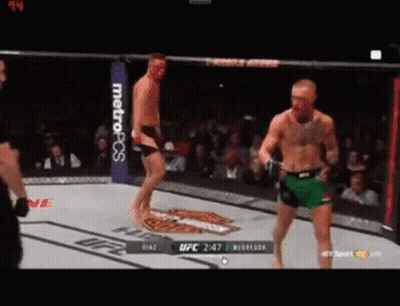 Two Men Fighting In UFC Ring GIF