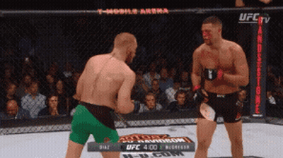 Two Men Fighting In UFC Ring GIF