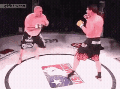 Two Men Fighting In UFC Ring GIF