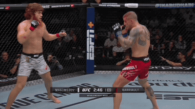 Two Men Fighting In UFC Ring With ESPN Logo GIF