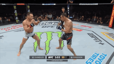 Two Men Fighting Monster In UFC Ring GIF