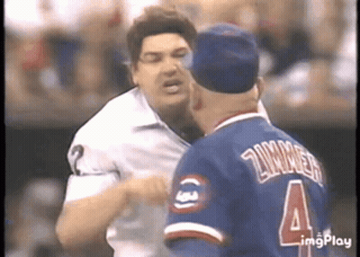 Two Men Fighting On Baseball Field One Wearing Jersey Number 4 GIF