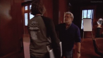 Two Men Fighting One Holding Arm