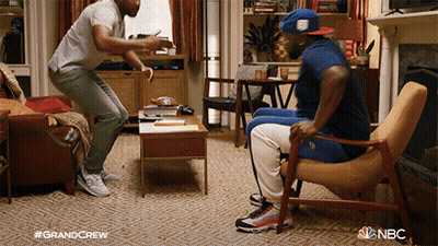Two Men Having Conversation In Living Room Grandcrew GIF