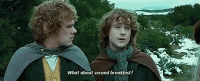 Two Men Holding Pitchers In A Crowd GIF