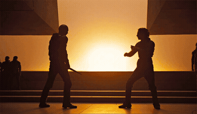 Two Men Holding Swords