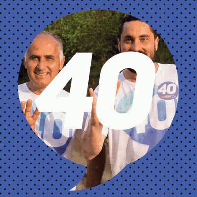 Two Men Holding Up Number 40 On Blue Background GIF