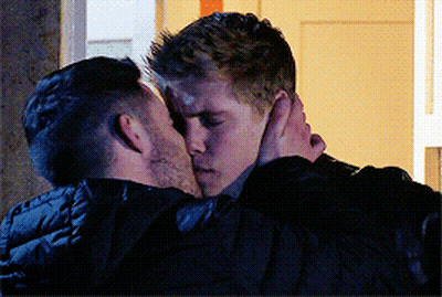 Two Men Hugging And Kissing GIF