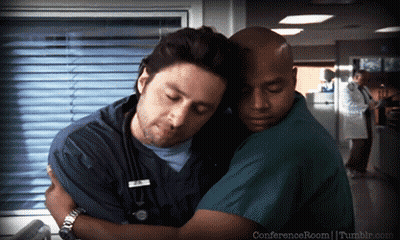 Two Men Hugging Each Other In A Room With The Words Conference Room Tumblr.com On The Bottom GIF