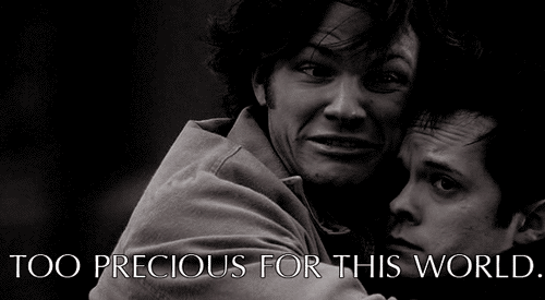 Two Men Hugging Each Other With The Words Too Precious For This World Below Them GIF