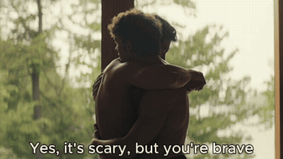 Two Men Hugging Each Other With The Words " Yes , It 'S Scary But You 'Re Brave " Above Them GIF