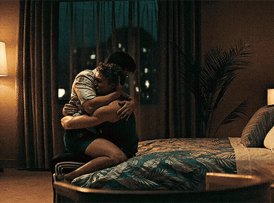 Two Men Hugging In Bedroom GIF