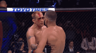 Two Men Hugging In Boxing Ring GIF