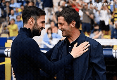 Two Men Hugging In Stadium Pixverse AI GIF
