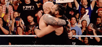 Two Men Hugging In Wrestling Ring GIF